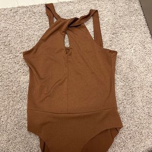 Brown body suit